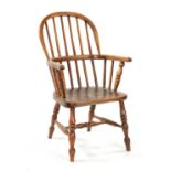 A 19TH CENTURY CHILD'S STICK-BACK WINDSOR CHAIR