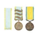 A CRIMEA 1854-56 MEDAL WITH THREE CLASPS