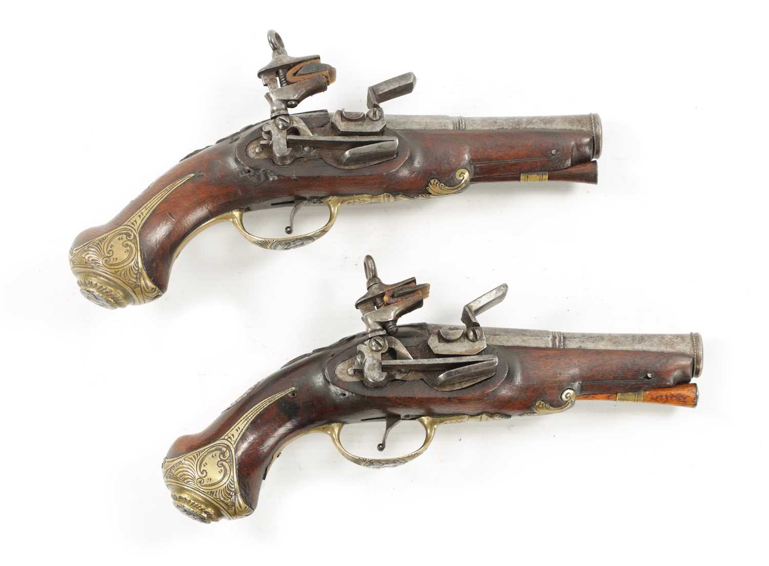 A PAIR OF 18TH CENTURY BRASS MOUNTED SPANISH FLINTLOCK PISTOLS