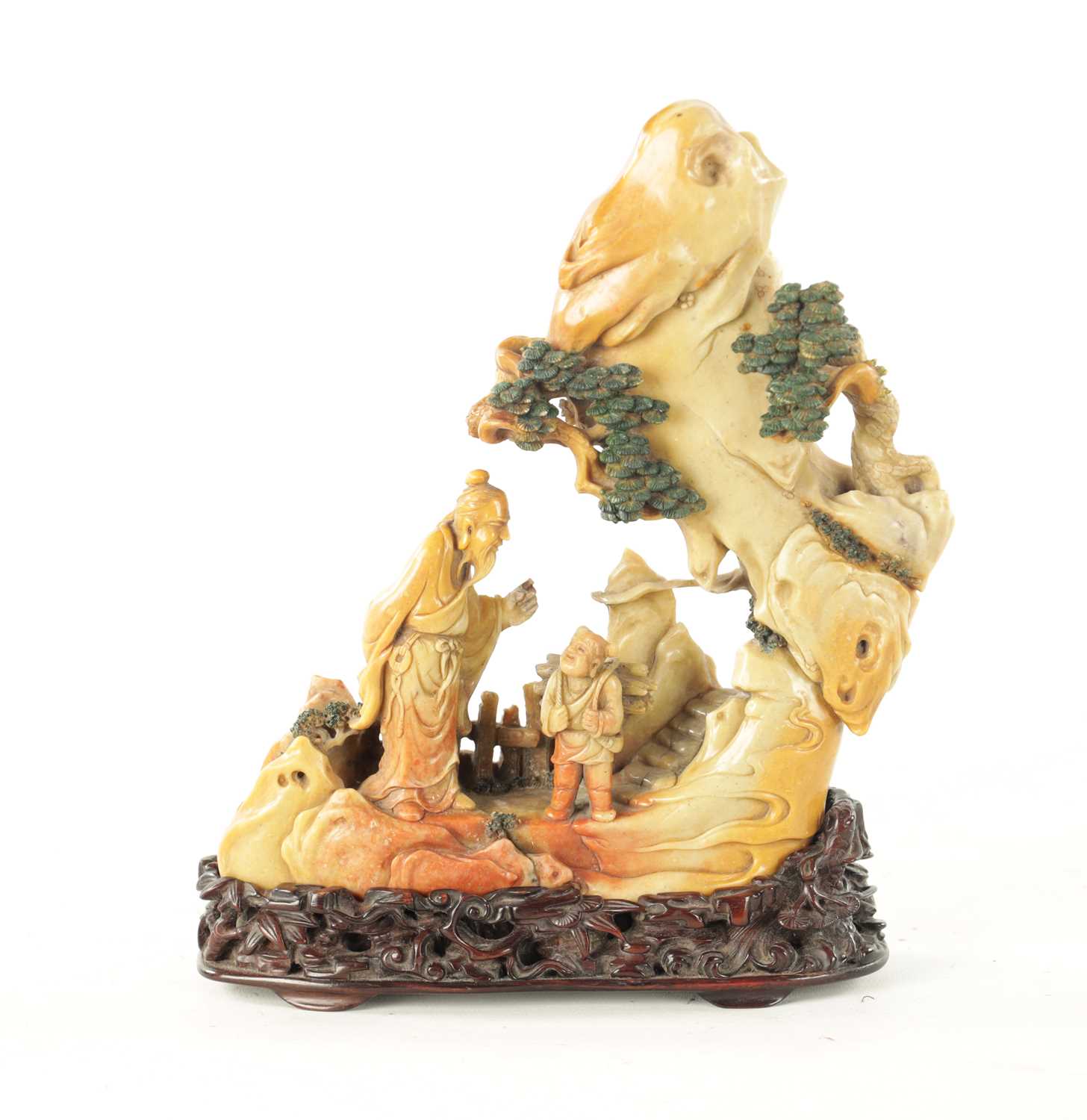 A CHINESE QING DYNASTY SOAPSTONE FIGURAL GROUP CARVING