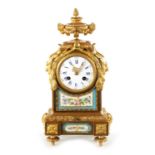 A LATE 19TH CENTURY FRENCH PORCELAIN PANELLED ORMOLU MANTEL CLOCK