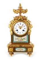 A LATE 19TH CENTURY FRENCH PORCELAIN PANELLED ORMOLU MANTEL CLOCK
