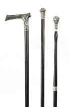 A COLLECTION OF THREE 19TH CENTURY SILVER TOPPED WALKING STICKS