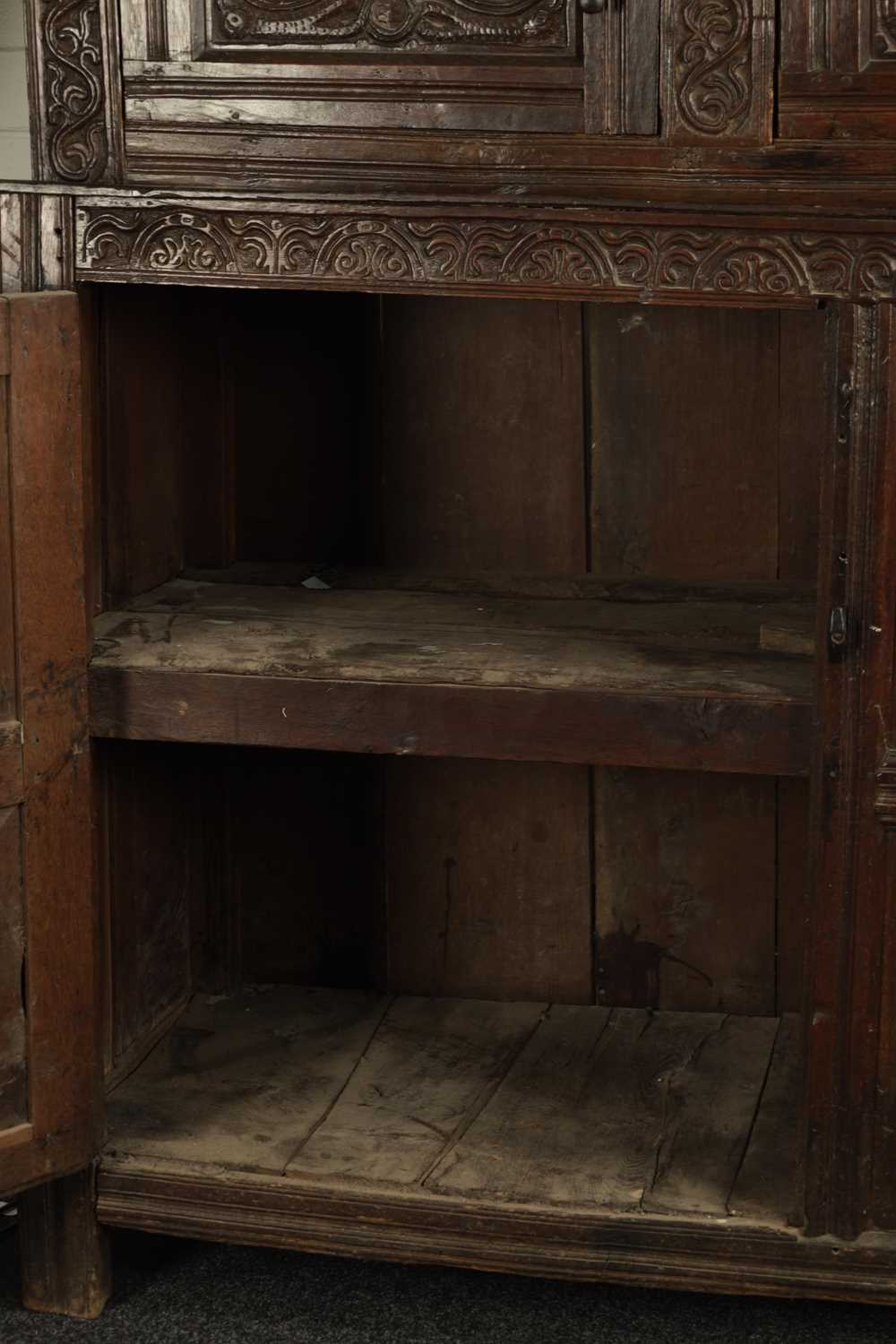 A GOOD LATE 17TH CENTURY OVERSIZED CARVED OAK WESTMORLAND COURT CUPBOARD DATED 1673 - Image 6 of 8