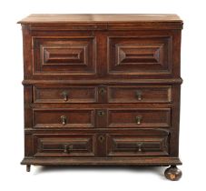 AN UNUSUAL 17TH CENTURY JACOBEAN MOULDED FRONT OAK CHEST OF DRAWERS