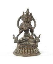 A 19TH CENTURY INDIAN TIBETAN BRONZE FIGURE OF A SEATED BUDDHA