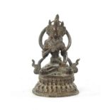 A 19TH CENTURY INDIAN TIBETAN BRONZE FIGURE OF A SEATED BUDDHA