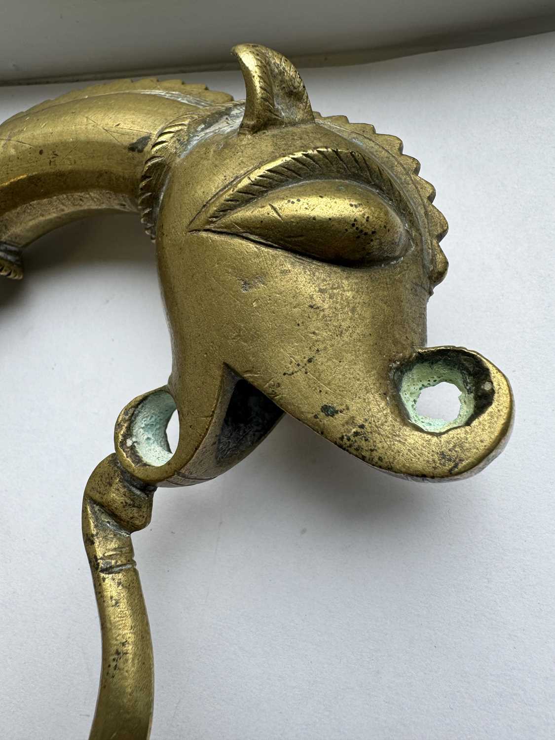 A 19TH CENTURY INDIAN RAJPUT BRONZE SWORD HILT - Image 10 of 12