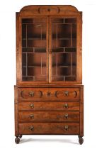 A FINE REGENCY MAHOGANY SECRETAIRE BOOKCASE IN THE MANNER OF GEORGE SMITH