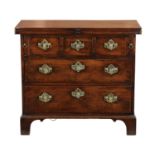 AN EARLY 18TH CENTURY WALNUT BACHELORS CHEST