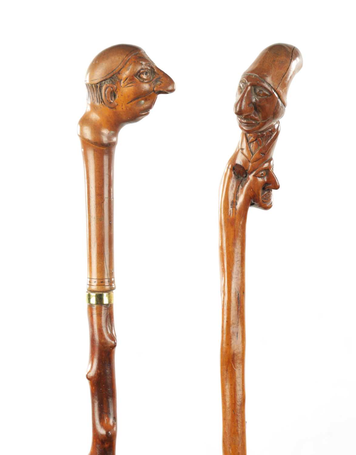 TWO LATE 19TH CENTURY FOLK ART CARVED WALKING CANES