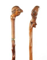 TWO LATE 19TH CENTURY FOLK ART CARVED WALKING CANES