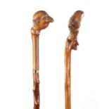 TWO LATE 19TH CENTURY FOLK ART CARVED WALKING CANES