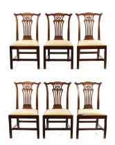 A FINE ORIGINAL SET OF SIX GEORGE III CHIPPENDALE PERIOD MAHOGANY PIERCED SPLAT BACK DINING CHAIRS