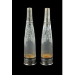A PAIR OF FRENCH SILVER TOPPED AND CUT GLASS DECANTER BOTTLES