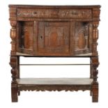 A 17TH CENTURY CARVED OAK BUFFET