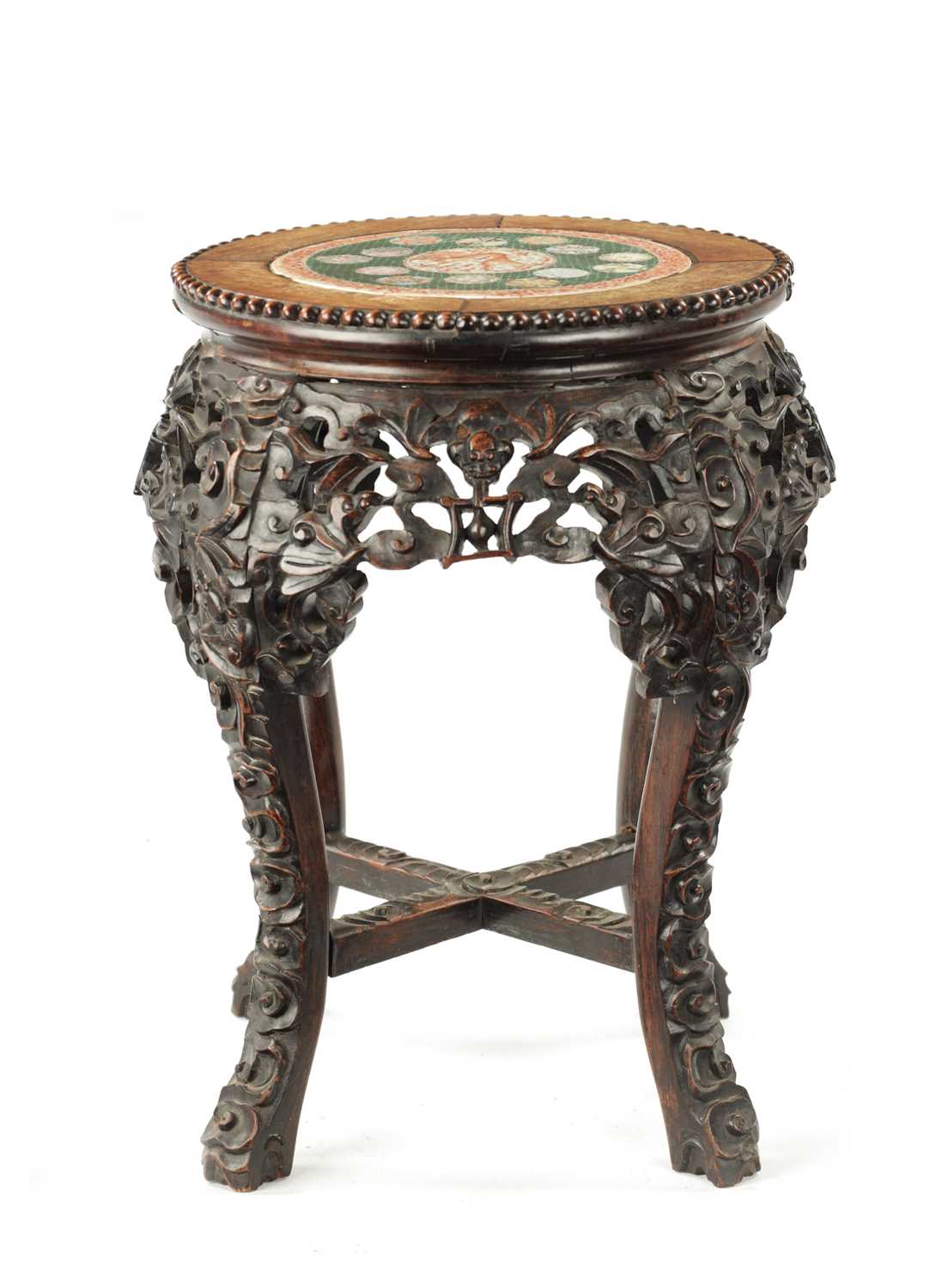 A 19TH CENTURY CHINESE HARDWOOD JARDINIERE STAND WITH CANTON PORCELAIN TOP