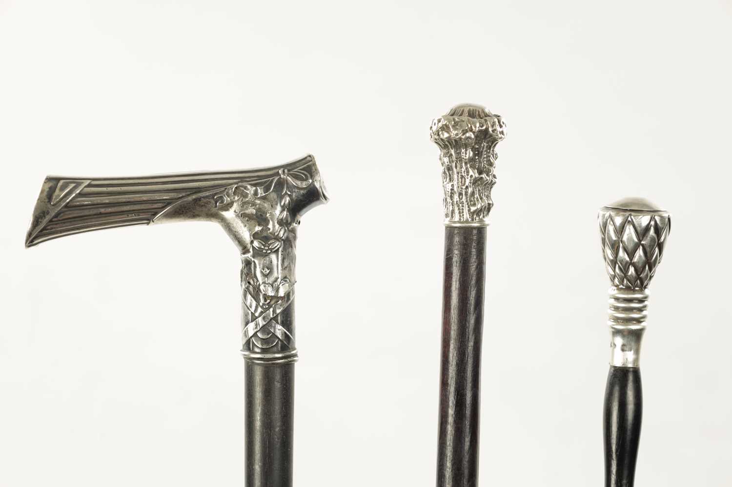A COLLECTION OF THREE 19TH CENTURY SILVER TOPPED WALKING STICKS - Image 2 of 7
