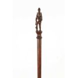 AN EARLY 20TH CENTURY INDIAN CARVED HARDWOOD CANE WITH CARVED GODESS HANDLE