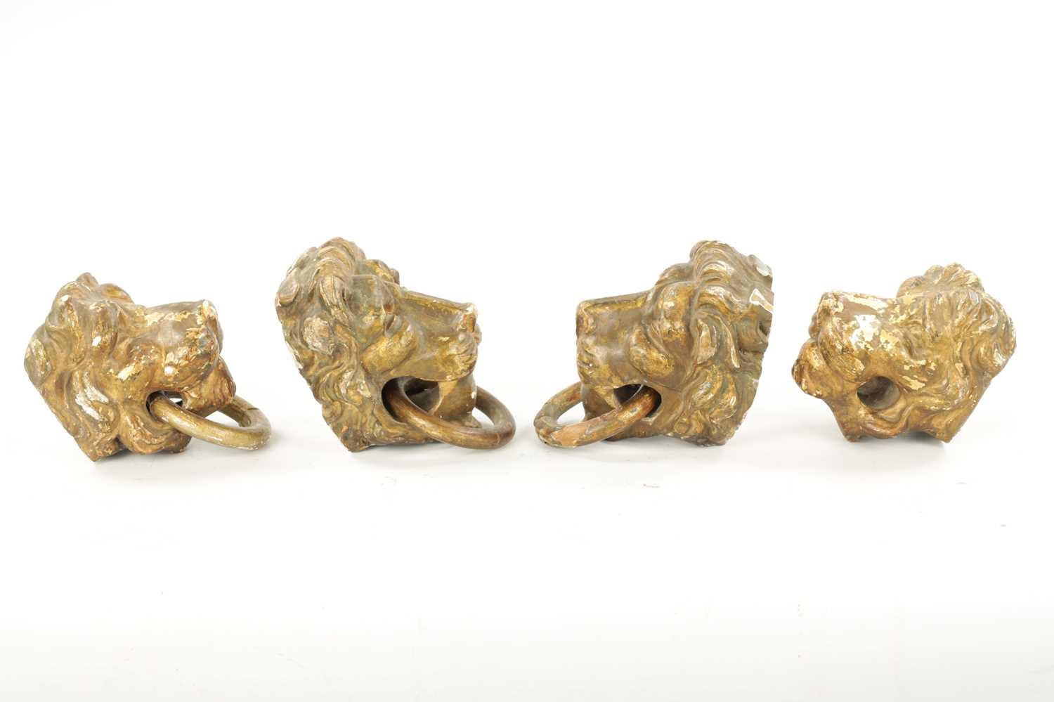 A SET OF FOUR REGENCY CARVED GILTWOOD LION'S HEADS - Image 8 of 9