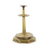 AN UNUSUAL 18TH CENTURY BRASS CANDLESTICK