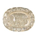 AN 18TH CENTURY GERMAN REPOUSSE SILVER AND SILVER GILT OVAL CHARGER