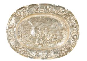 AN 18TH CENTURY GERMAN REPOUSSE SILVER AND SILVER GILT OVAL CHARGER