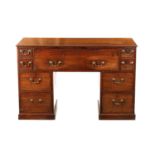 A GEORGE III MAHOGANY LIBRARY DESK