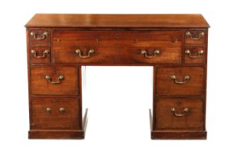 A GEORGE III MAHOGANY LIBRARY DESK