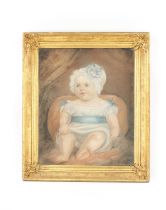 A 19TH CENTURY PASTEL OF A SEATED CHILD WITH BONNET
