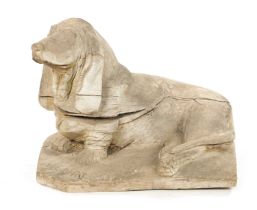 A 19TH CENTURY CARVED WOOD SCULPTURE OF A SEATED DOG