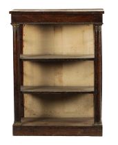 A SMALL REGENCY EMPIRE SIMULATED ROSEWOOD OPEN BOOKCASE