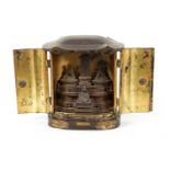 A 19TH CENTURY BLACK LACQUER BUDDHIST TRAVELLING PRAYER SHRINE