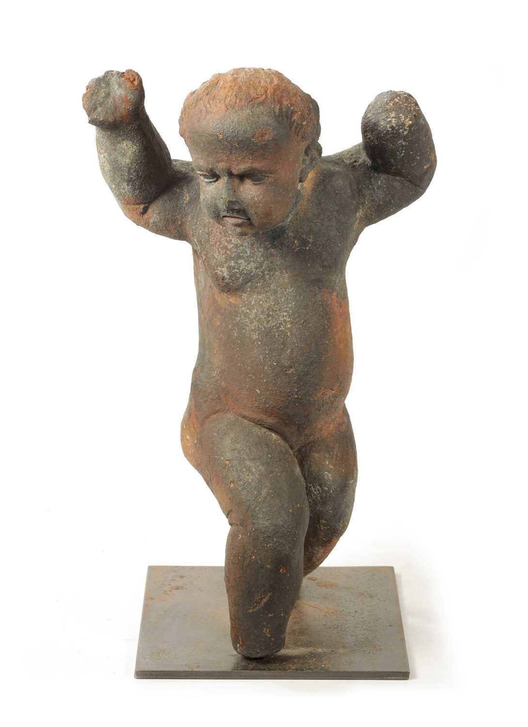 AN EARLY 18TH CENTURY TERRACOTTA FIGURE OF STANDING CHERUB