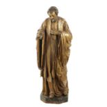 AN EARLY 17TH CENTURY CARVED WOOD GILT GESSO FIGURE OF CHRIST