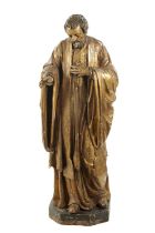 AN EARLY 17TH CENTURY CARVED WOOD GILT GESSO FIGURE OF CHRIST