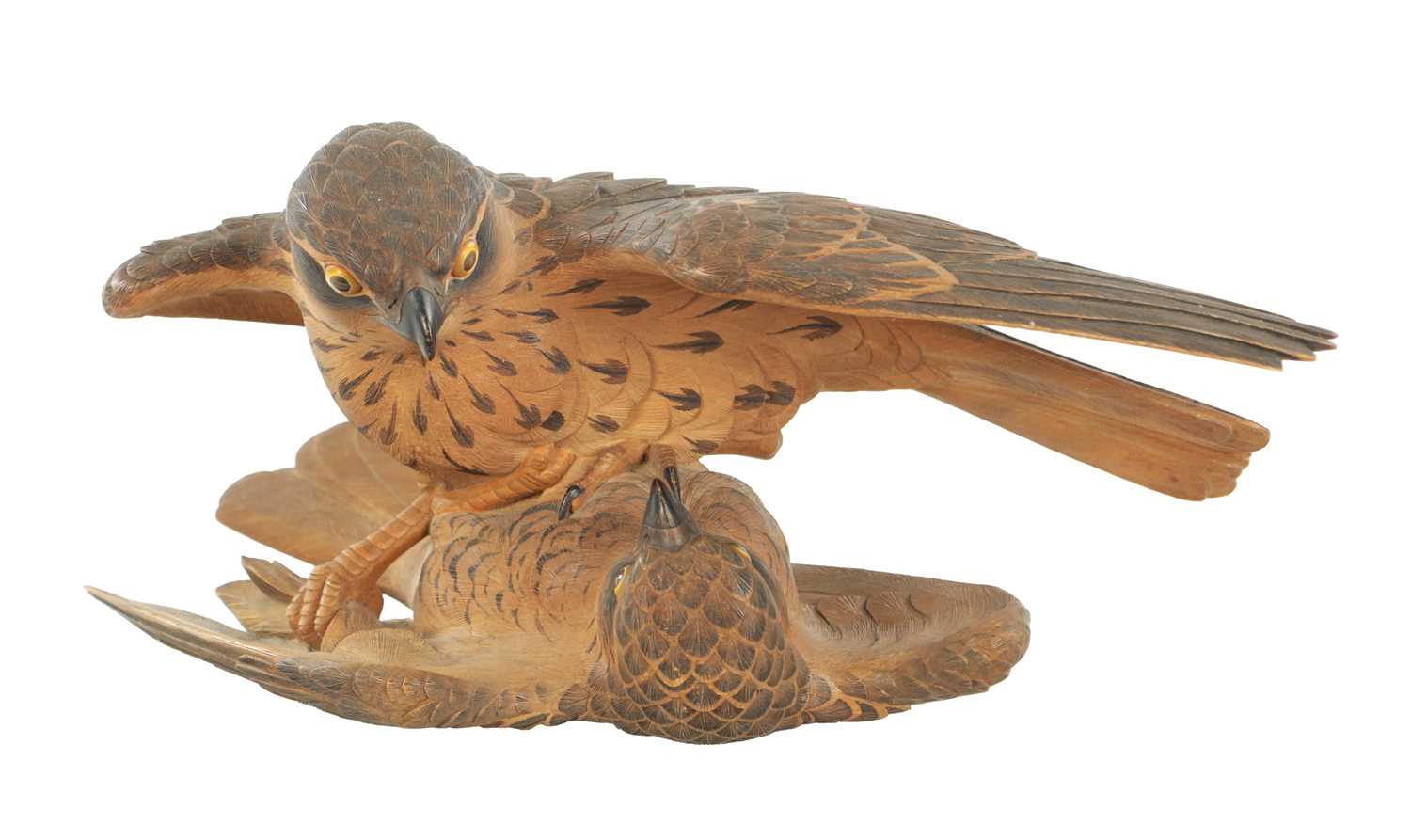 A JAPANESE MEIJI PERIOD CARVED WOOD OKIMONO OF TWO QUARRELLING HAWKS