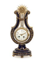 A LATE 19TH CENTURY FRENCH PORCELAIN AND ORMOLU MOUNTED LYRE-SHAPED MANTEL CLOCK