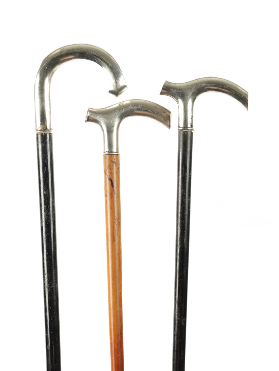 A COLLECTION OF THREE 19TH CENTURY SILVER TOPPED WALKING STICKS