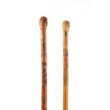 TWO 19TH CENTURY ORIENTAL BAMBOO CARVED WALKING CANES