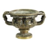 A 19TH-CENTURY CAST BRONZE PEDESTAL BOWL MODELLED ON THE WARWICK VASE