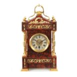 A LATE 19TH CENTURY FRENCH ORMOLU MOUNTED ROUGE MARBLE MANTEL CLOCK