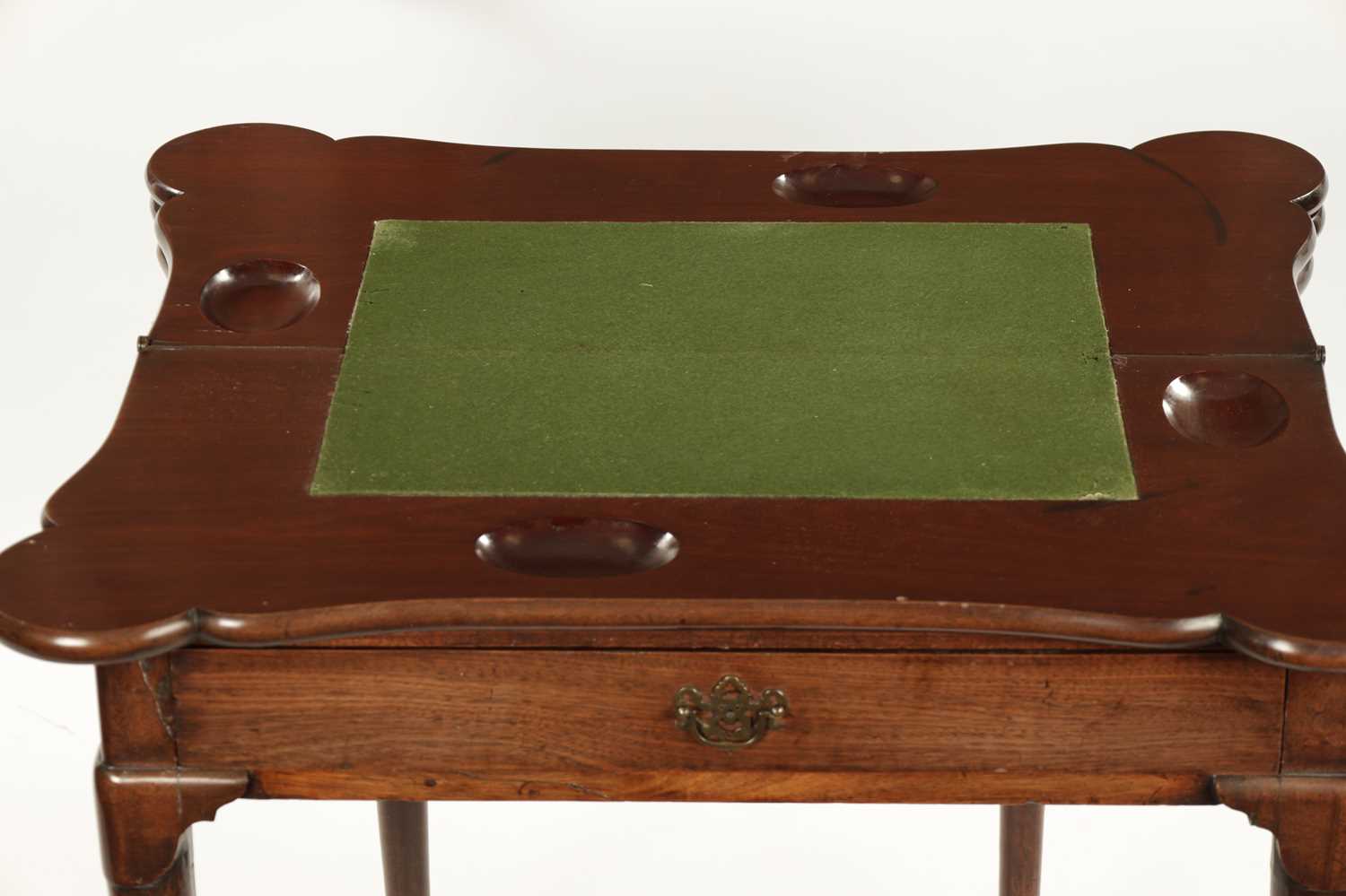 A GEORGE II FIGURED MAHOGANY TRIPLE TOP FOLD-OVER GAMES TABLE - Image 8 of 8