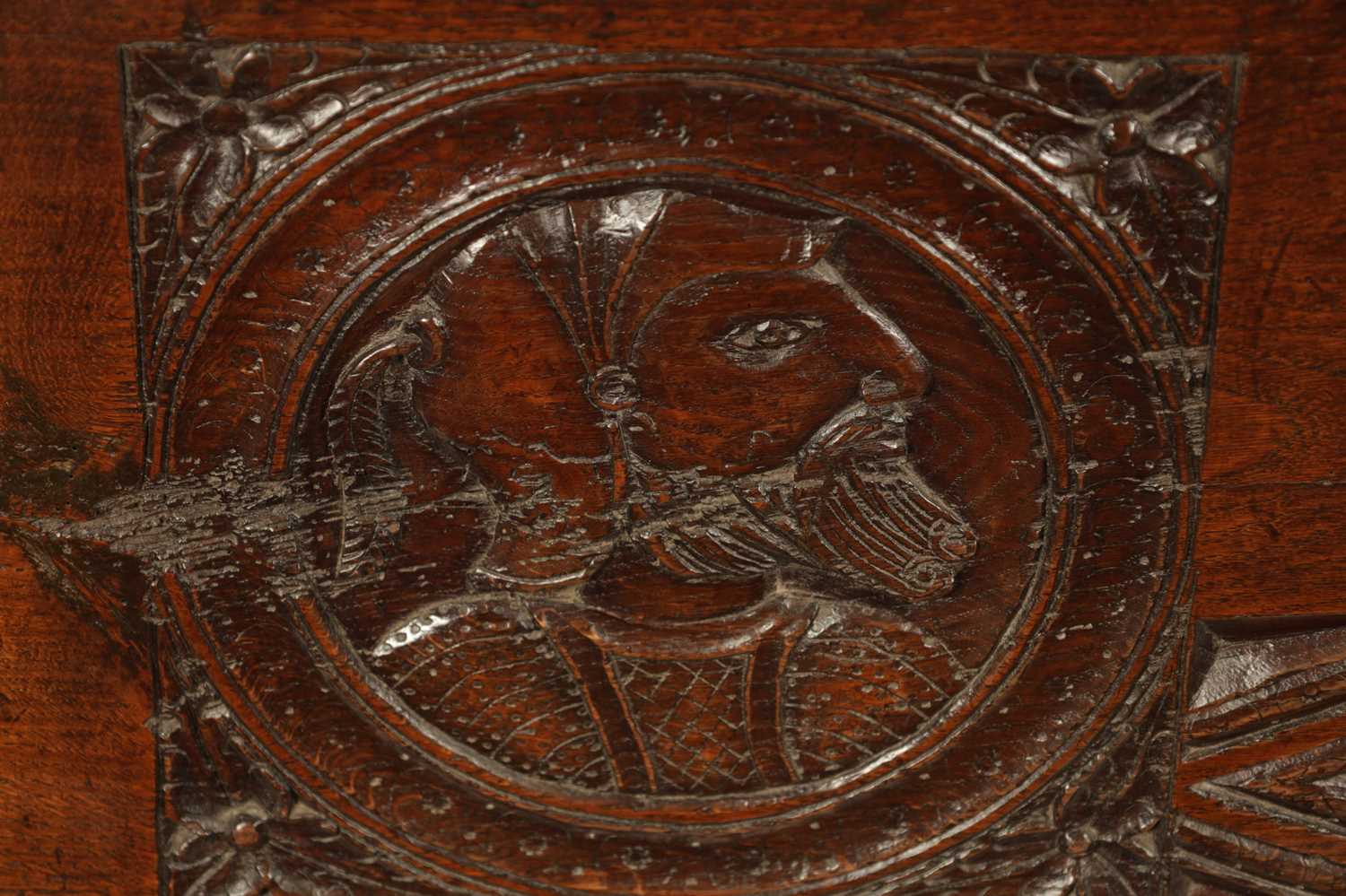 AN IMPORTANT 17TH CENTURY CARVED OAK PLANK COFFER WITH CARVED ROMANESQUE HEADS - Image 7 of 8