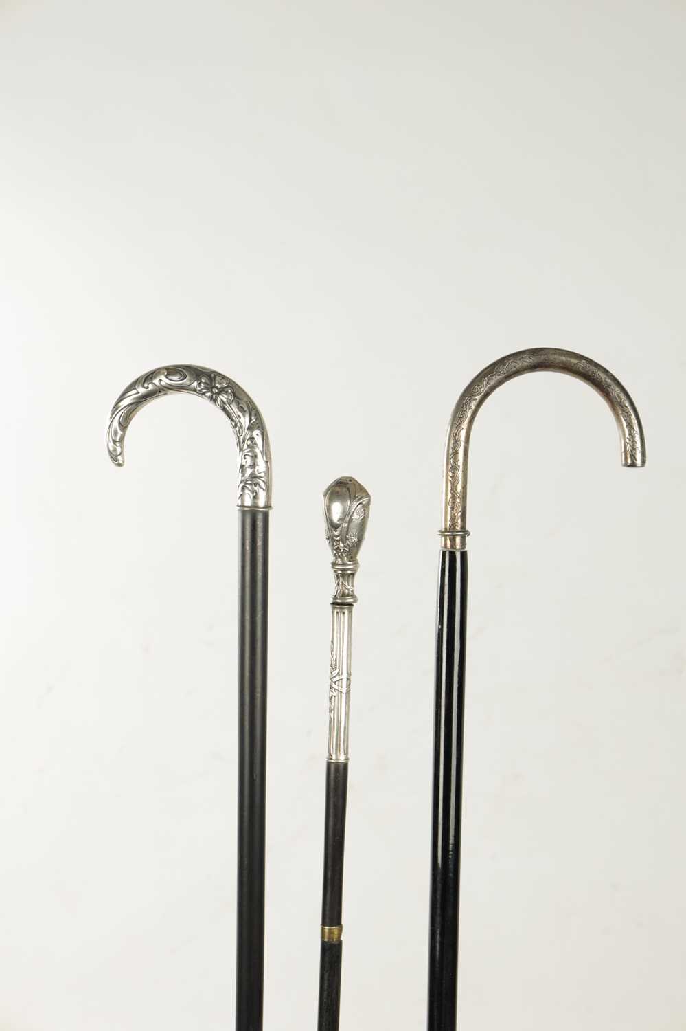 A COLLECTION OF THREE ART NOUVEAU SILVER TOPPED WALKING STICKS - Image 3 of 13
