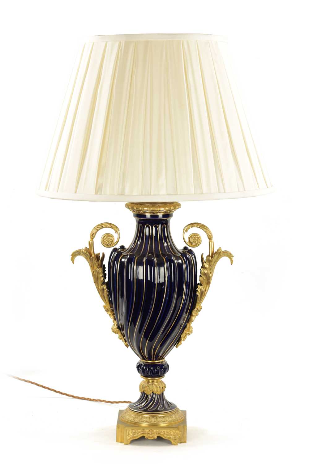 A LATE 19TH CENTURY ORMOLU AND SEVRES PORCELAIN VASE CONVERTED TO A LAMP