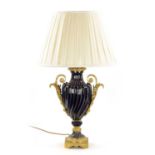 A LATE 19TH CENTURY ORMOLU AND SEVRES PORCELAIN VASE CONVERTED TO A LAMP