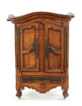 AN 18TH CENTURY FRUITWOOD MINIATURE ARMOIRE