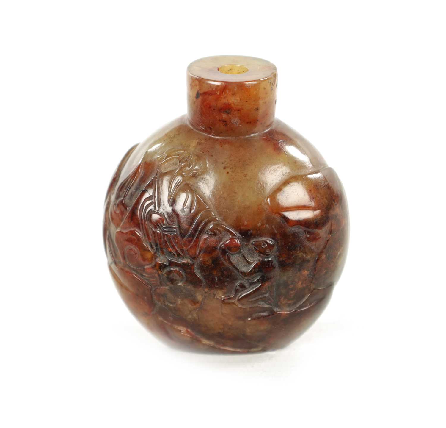 A CHINESE CARVED RUSSET JADE SNUFF BOTTLE
