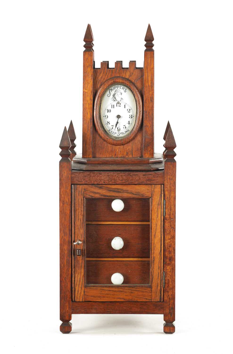 AN EDWARDIAN SKIPPER'S ADVERTISING CLOCK / CIGARETTE CABINET